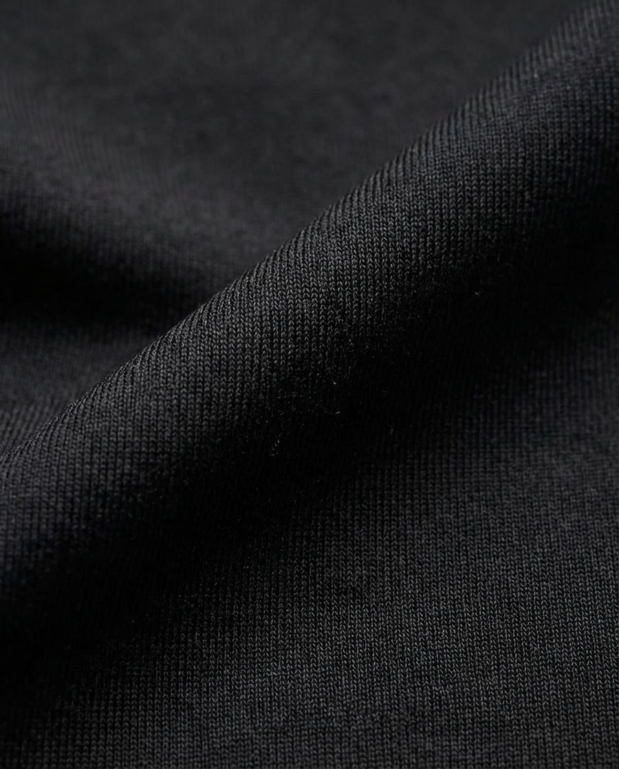 Close detail of the Apex Tee four-way-stretch performance knit